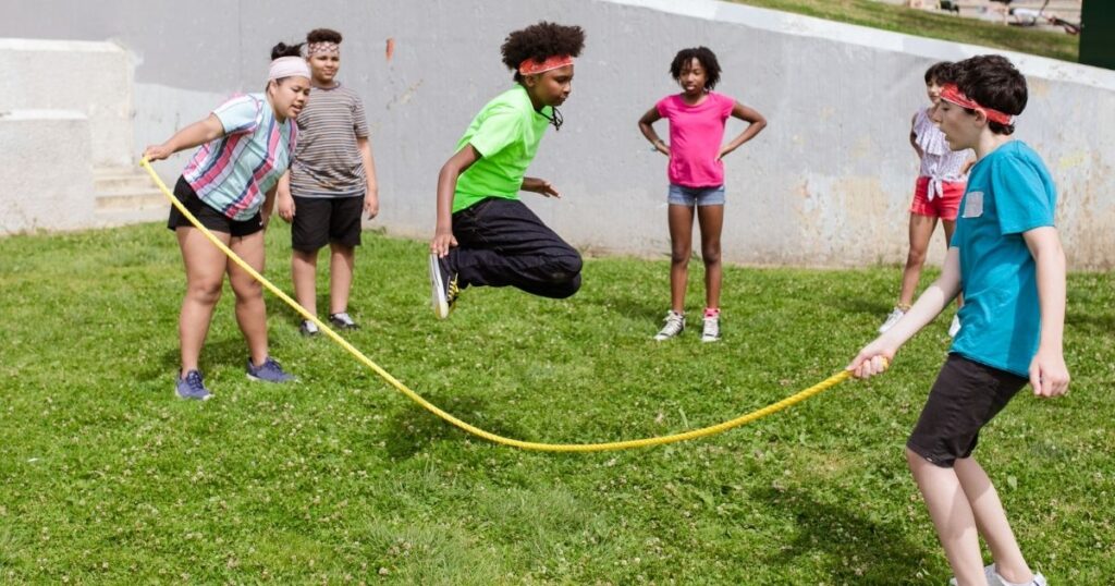 Homeschooled child exploring outdoors during afternoon learning time—engaging in nature, movement, and hands-on discovery as part of a relaxed daily rhythm.